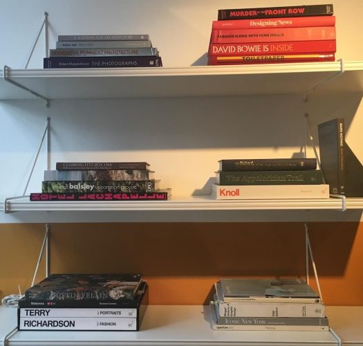 Books in the waiting area of The Participation Agency's offices on the Lower East Side of Manhattan.