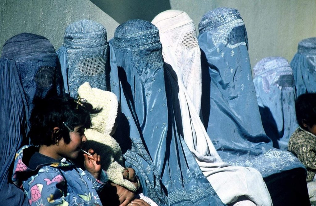 In this undated photo, a group of women in Afghanistan are seeing wearing burkas. (Photo by USAID via Pixnio)