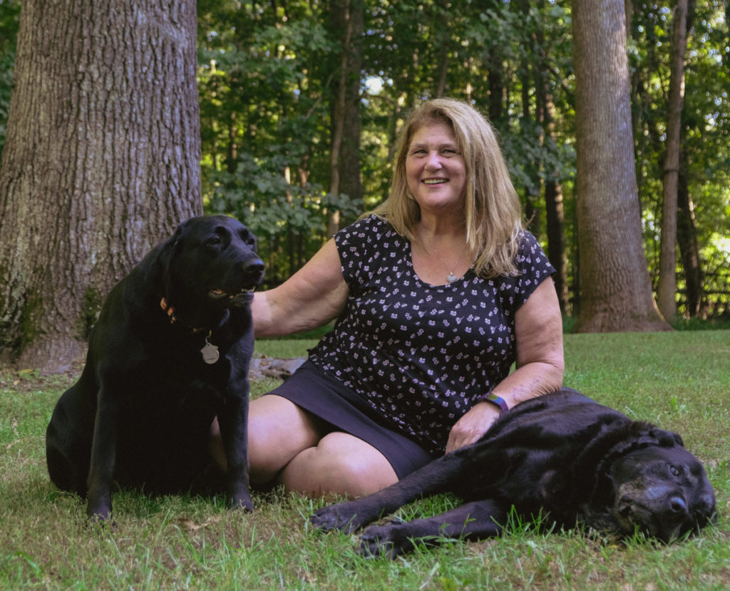 Becky O'Neil of Becky's Pet Care, with a few friends. (Credit: Courtesy of the company.)