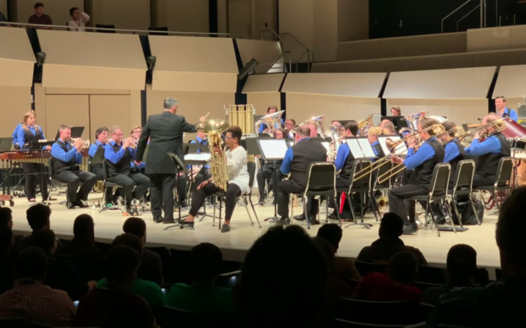 Tuba player Velvet Brown, seen performing as a featured soloist in a brass ensemble. She's one of a growing number of classical musicians pushing for better representation. (Credit: YouTube)