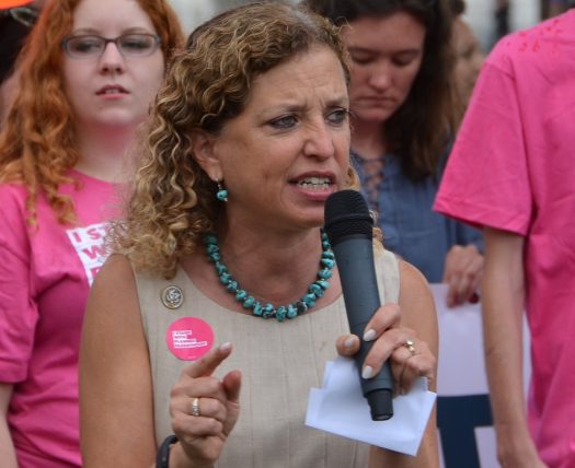 Debbie Wasserman Schultz talks about the attacks she endured for wearing her curly hair natural on the podcast "We Are Spiraling." (Credit: Flickr)