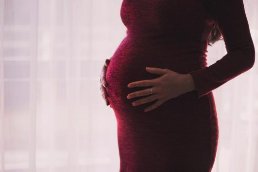 Pregnant women on Medicaid will suffer from federal funding cuts to the program. (Credit: Freerangestock)
